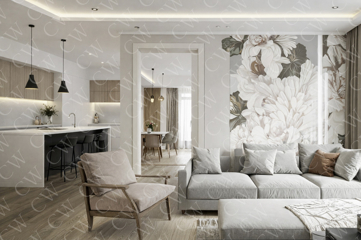 Helles Wohnzimmer mit grauem Sofa, offener Küche und großer Blumenmuster-Wand.