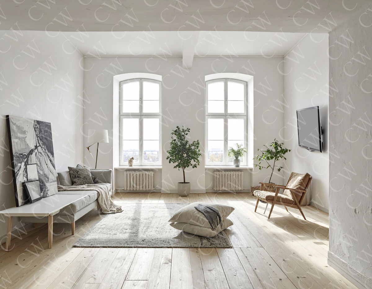 Modernes, helles Wohnzimmer mit großen Fenstern, Holzboden und minimalistischer Einrichtung.