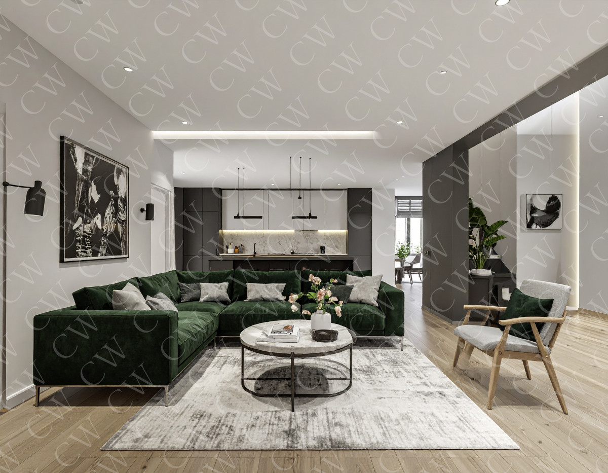 Modern eingerichtetes Wohnzimmer mit grüner Couch, Teppich und offener Küche im Hintergrund.