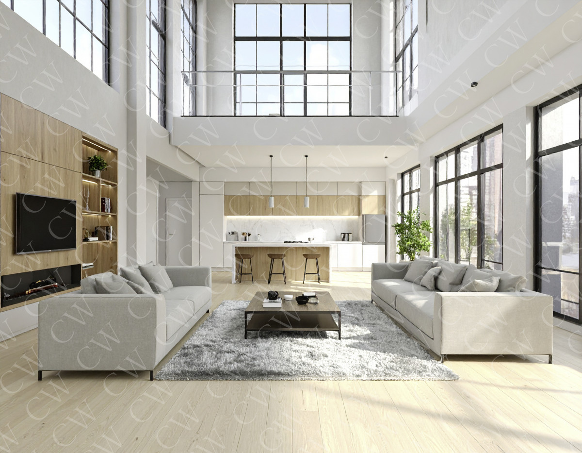 Helles, modernes Loft-Wohnzimmer mit zwei Sofas, Teppich, Couchtisch und offener Küche im Hintergrund.