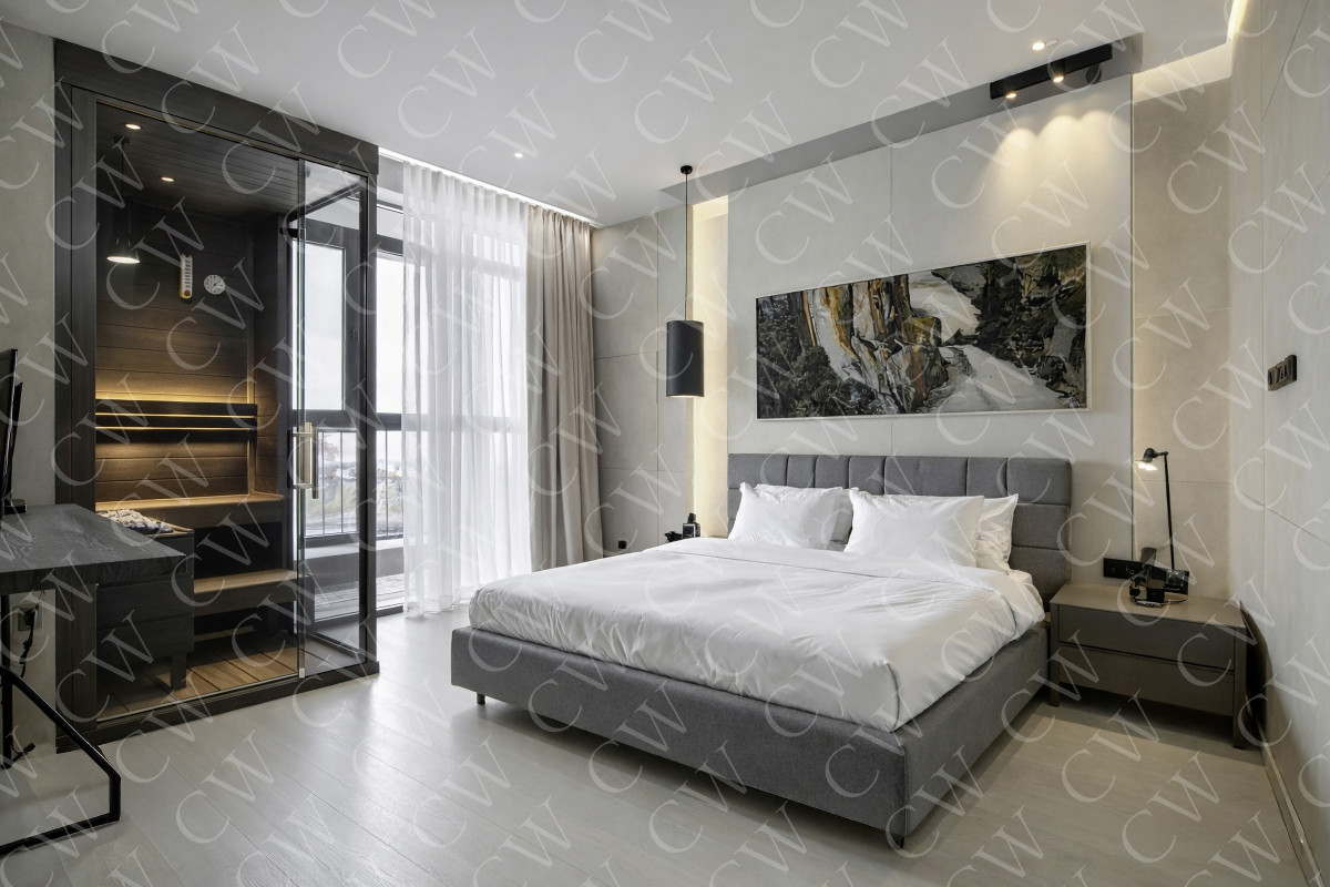 Helles, modernes Hotelzimmer mit großem Bett und eingebauter Sauna neben dem Fenster